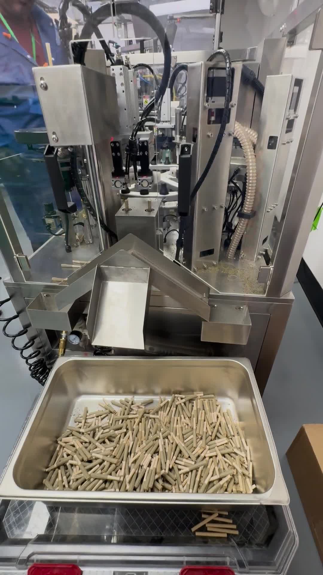 Exterior view of the Apollo checkweigher transfer mechanism and collection area at Verano